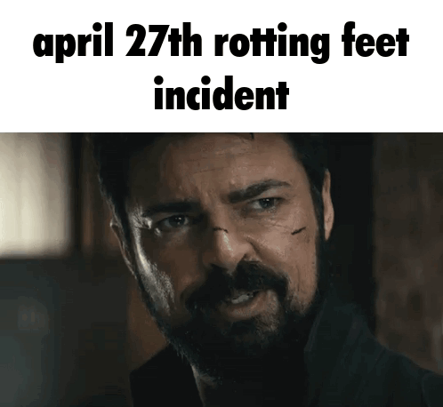 A Man With A Beard Is Making A Funny Face With The Words April 27Th Rotting Feet Incident GIF