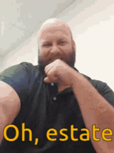 A Man With A Beard Is Making A Funny Face With The Words Oh Estate GIF