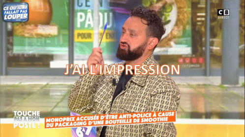 A Man With A Beard Is On A Television Screen With The Words J'ai L' Impression GIF