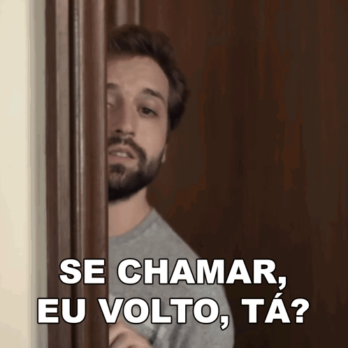 A Man With A Beard Is Peeking Through A Door And Says Se Chamar Eu Volto Ta ? GIF