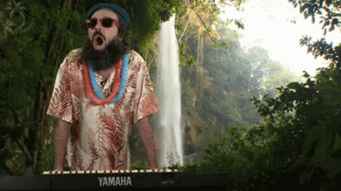 A Man With A Beard Is Playing A Yamaha Keyboard GIF