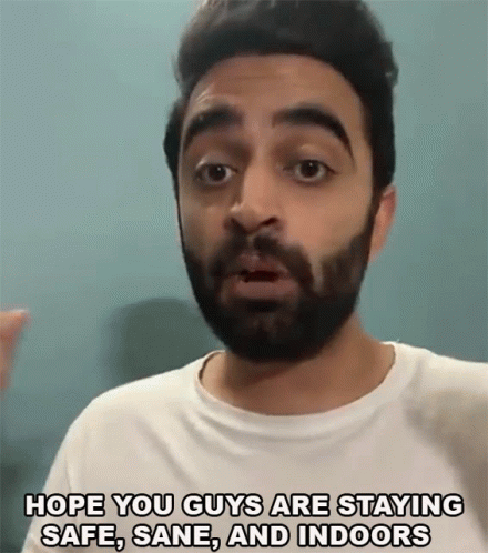 A Man With A Beard Is Saying `` Hope You Guys Are Staying Safe , Sane And Indoors '' GIF