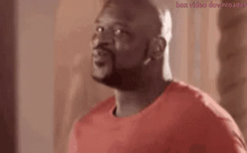 A Man With A Beard Is Saying `` I 'M Baaack '' . GIF