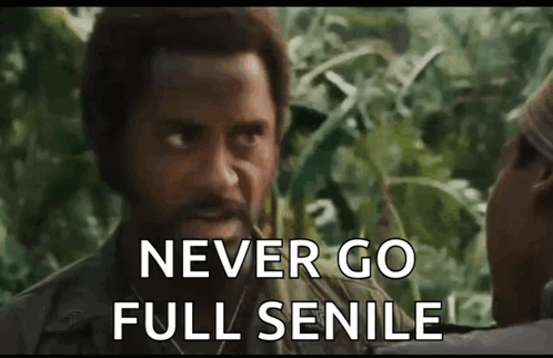 A Man With A Beard Is Saying `` Never Go Full Senile '' While Talking To Another Man . GIF