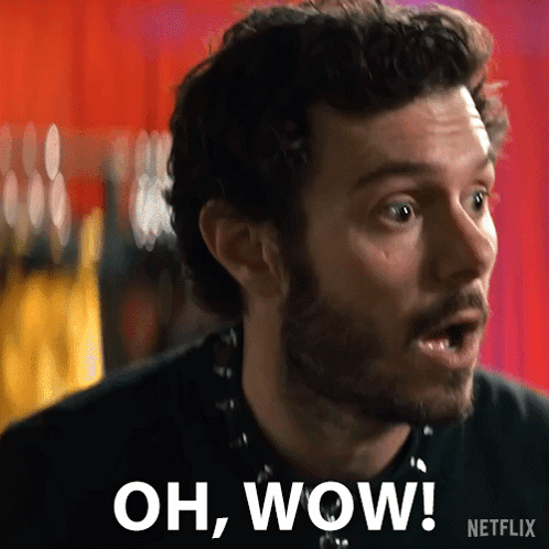 A Man With A Beard Is Saying " Oh Wow " GIF