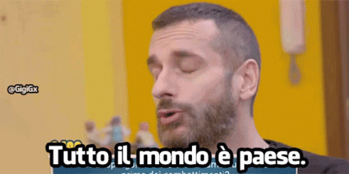 A Man With A Beard Is Saying Tutto Il Mondo E Paese GIF