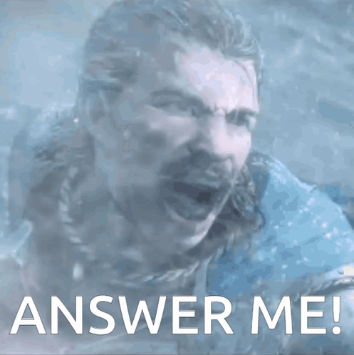A Man With A Beard Is Screaming With The Words Answer Me Written Below Him GIF