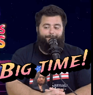 A Man With A Beard Is Singing Into A Microphone With The Words Big Time Written On The Bottom GIF