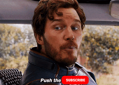 A Man With A Beard Is Sitting In A Car With A Button That Says Push The Subscribe GIF