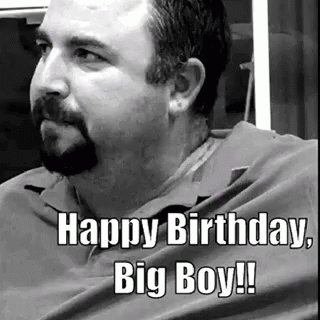 A Man With A Beard Is Sitting In A Chair And Says Happy Birthday Big Boy GIF