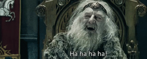 A Man With A Beard Is Sitting In A Chair With The Words Ha Ha Ha Ha Written Below Him GIF