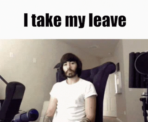 A Man With A Beard Is Sitting In A Chair With The Words I Take My Leave Above Him GIF