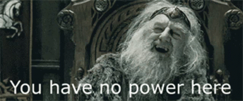A Man With A Beard Is Sitting In A Chair With The Words " You Have No Power Here " Written Below Him GIF