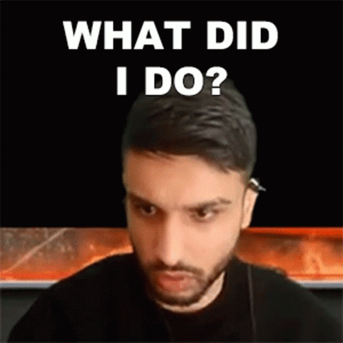 A Man With A Beard Is Sitting In Front Of A Black Screen With The Words `` What Did I Do '' . GIF