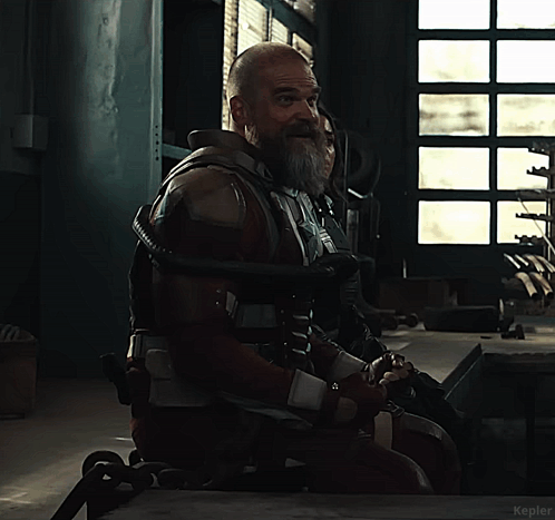 Man With Beard Sitting Next To Woman In Dark Room Kepler GIF