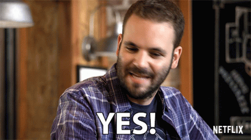 Bearded Man Smiling And Saying Yes GIF