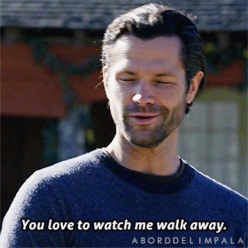 a man with a beard is smiling and says you love to watch me walk away