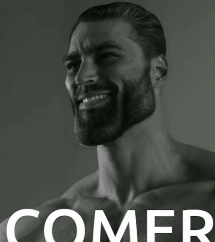 A Man With A Beard Is Smiling In A Black And White Photo With The Word Comer On The Bottom GIF
