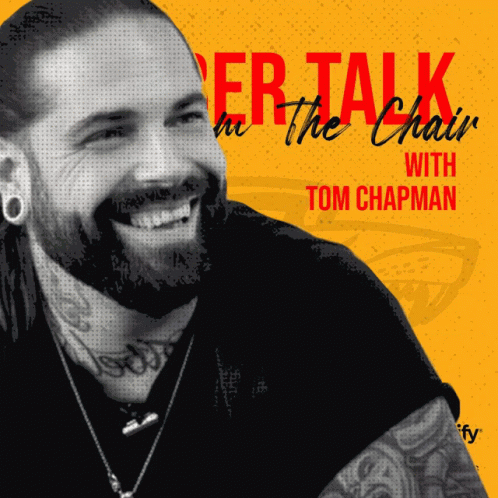 A Man With A Beard Is Smiling On The Cover Of A Book Called Talk In The Chair With Tom Chapman GIF