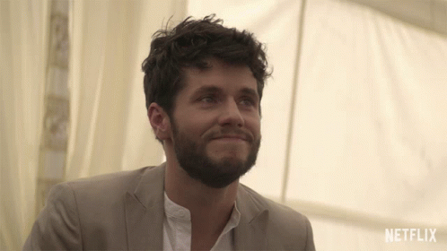 Man Smiling With Netflix Logo GIF