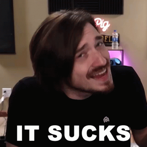Bearded Man Smiling With It Sucks Text GIF