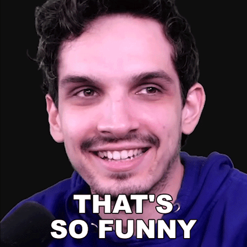 A Man With A Beard Is Smiling With The Words That 'S So Funny On His Face GIF