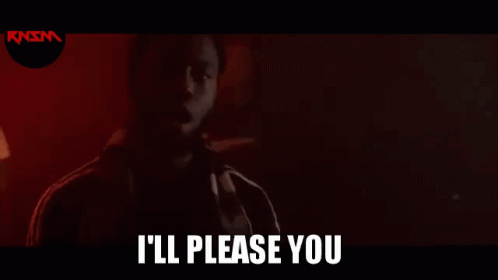 A Man With A Beard Is Standing In A Dark Room With The Words `` I 'Ll Please You '' Written Above Him . GIF
