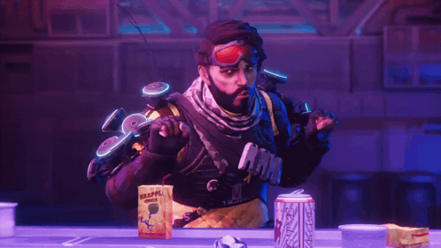 A Man With A Beard Is Standing In Front Of A Can Of Coca Cola GIF