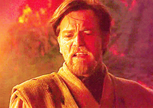 A Man With A Beard Is Standing In Front Of A Fire With His Eyes Closed And His Face Covered In Blood . GIF