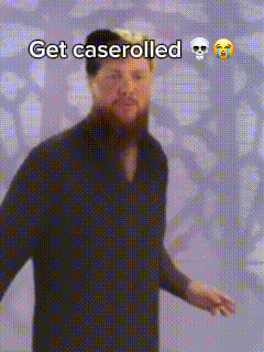 A Man With A Beard Is Standing In Front Of A Purple Background With The Words Get Caserolled On It GIF