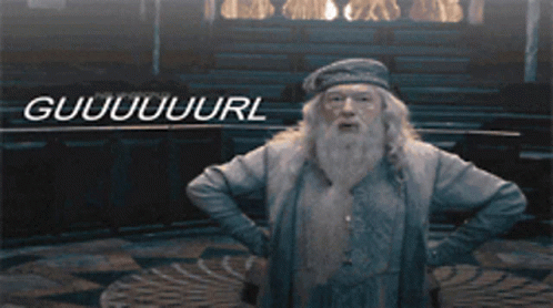 A Man With A Beard Is Standing In Front Of A Sign That Says Guuuuurl GIF