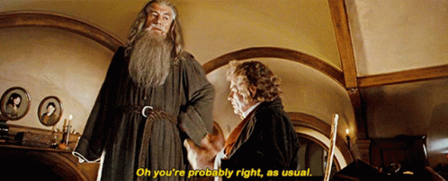 A Man With A Beard Is Standing Next To Another Man And Says " Oh You 'Re Probably Right As Usual " GIF