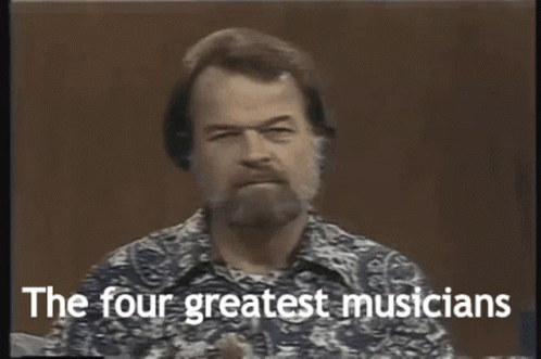 A Man With A Beard Is Talking About Four Greatest Musicians GIF