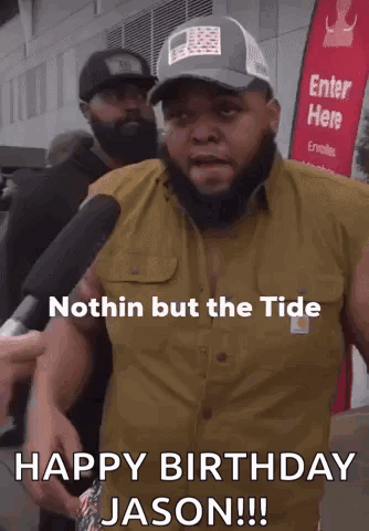 a man with a beard is talking into a microphone and says nothin but the tide happy birthday jason