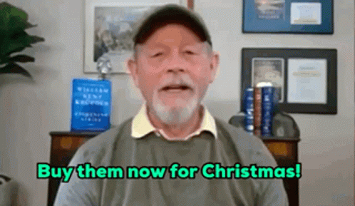 A Man With A Beard Is Talking On A Video Call And Saying Buy Them Now For Christmas . GIF