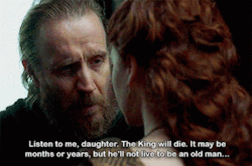 a man with a beard is talking to a woman with red hair and says listen to me daughter