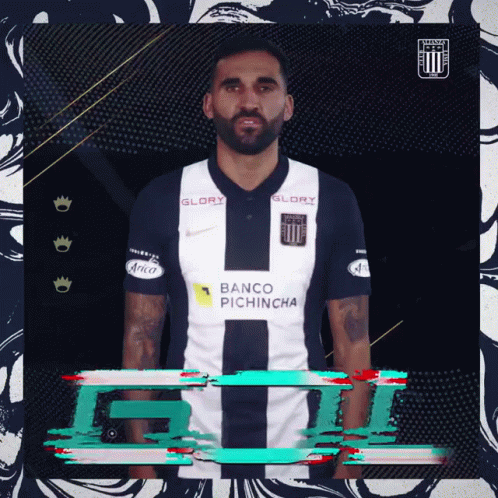 A Man With A Beard Is Wearing A Banco Pichincha Jersey GIF