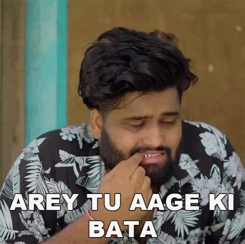 A Man With A Beard Is Wearing A Black And White Floral Shirt And Says " Arey Tu Aage Ki Bata " GIF