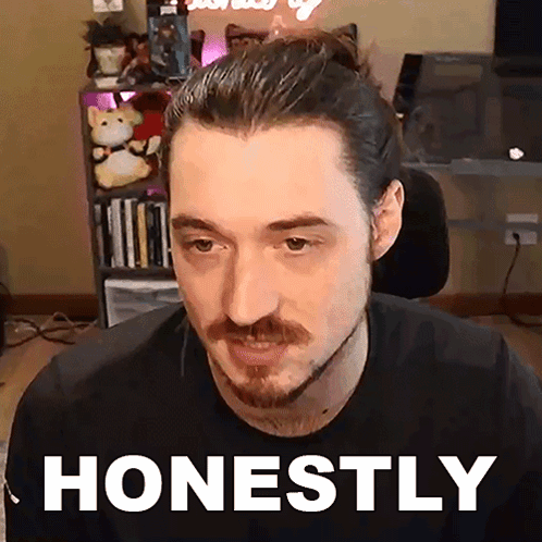 a man with a beard is wearing a black shirt with the word honestly on it