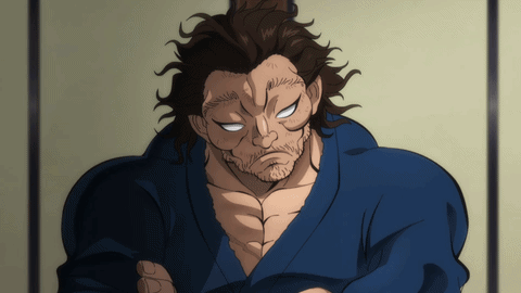 A Man With A Beard Is Wearing A Blue Kimono GIF