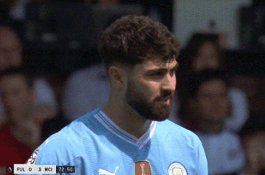 A Man With A Beard Is Wearing A Blue Shirt That Says Ful 0 3 Mci 72:50 GIF