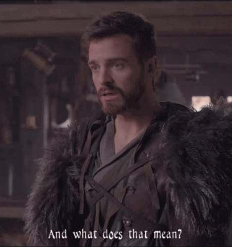A Man With A Beard Is Wearing A Fur Coat And Says " And What Does That Mean " GIF