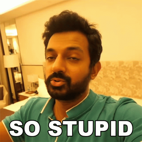 A Man With A Beard Is Wearing A Green Shirt That Says So Stupid On It GIF