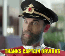 A Man With A Beard Is Wearing A Hat And A Red Shirt And Says Thanks Captain Obvious . GIF