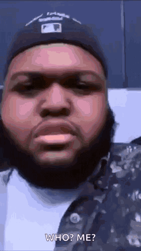 A Man With A Beard Is Wearing A Hat And Asking Who ? Me ? GIF