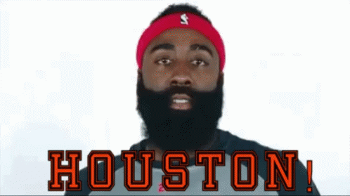 A Man With A Beard Is Wearing A Headband That Says Houston On It GIF