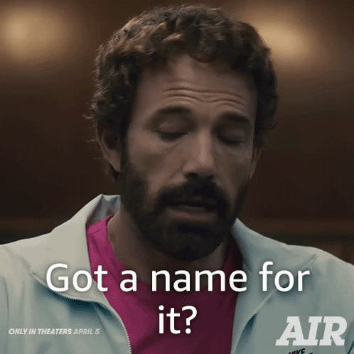 A Man With A Beard Is Wearing A Nike Jacket GIF