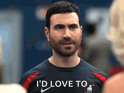 A Man With A Beard Is Wearing A Nike Shirt And Saying I 'D Love To . GIF