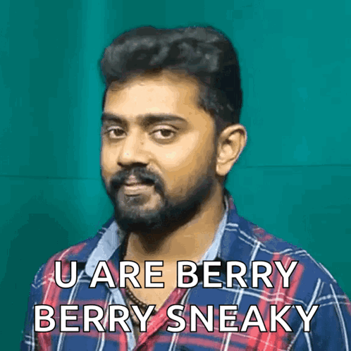 A Man With A Beard Is Wearing A Plaid Shirt And Says " U Are Berry Berry Sneaky " GIF