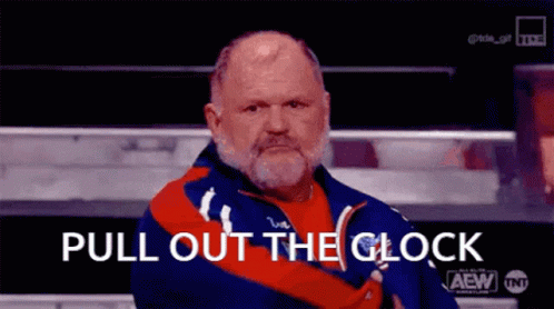 A Man With A Beard Is Wearing A Red And Blue Jacket And Says Pull Out The Clock GIF